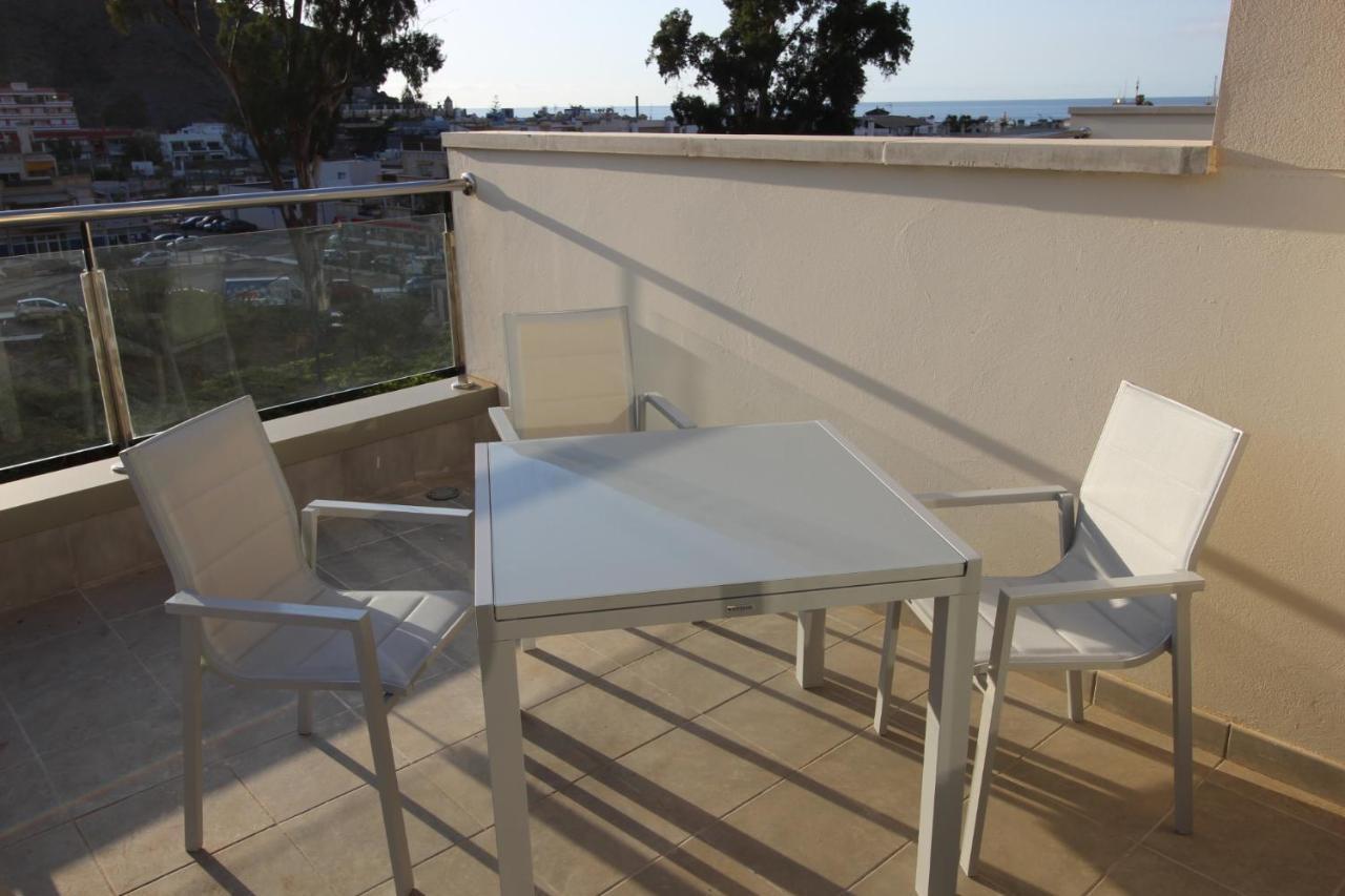 Sun, Sea And Rocks Apartment ปวยร์โต เด มอแกน ภายนอก รูปภาพ