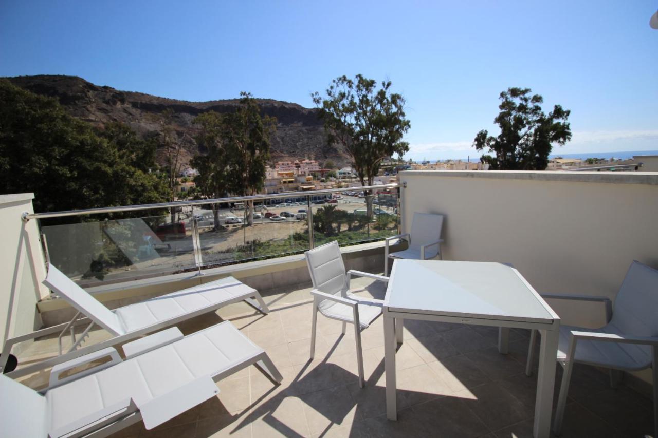 Sun, Sea And Rocks Apartment ปวยร์โต เด มอแกน ภายนอก รูปภาพ